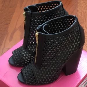 Gently used black booties